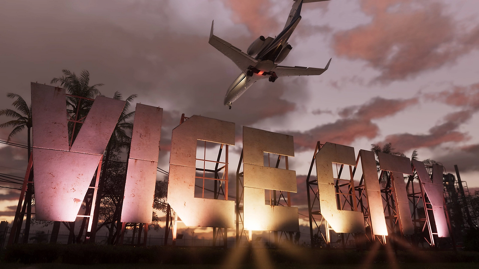 Vice City sign at sunset with an aircraft overhead